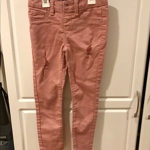 Pink jeans with stylish rips/tears never worn